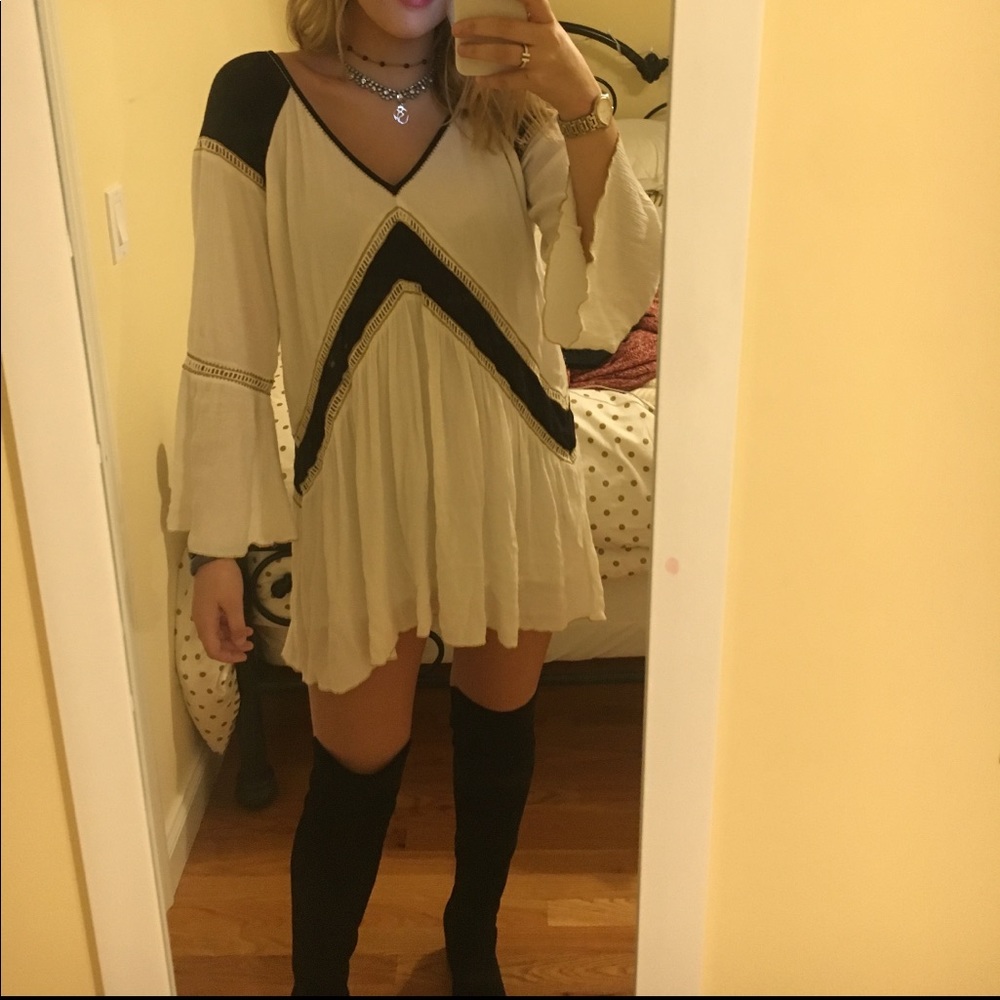 Black and white long-sleeve dress w/ gold details